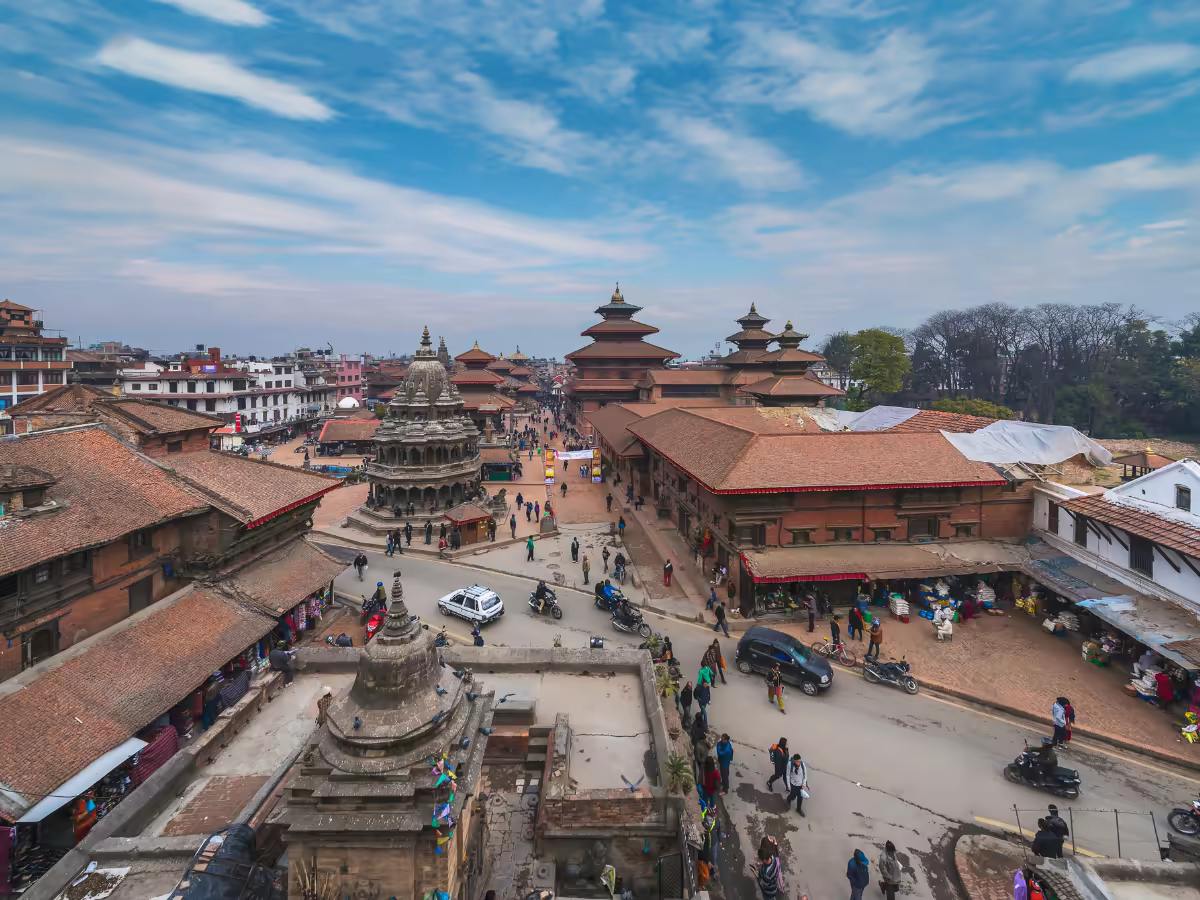 Carved temples and Kumari Ghar in Kathmandu Durbar Square.
