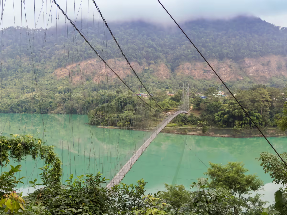 The Trishuli River winding below Nepal's green hills.