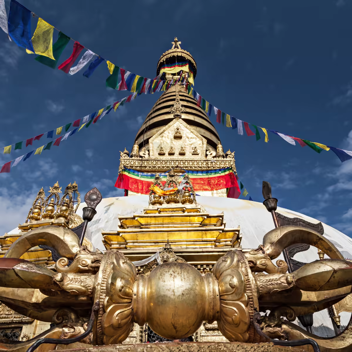 Swayambhunath Stupa above Kathmandu Valley in morning light.