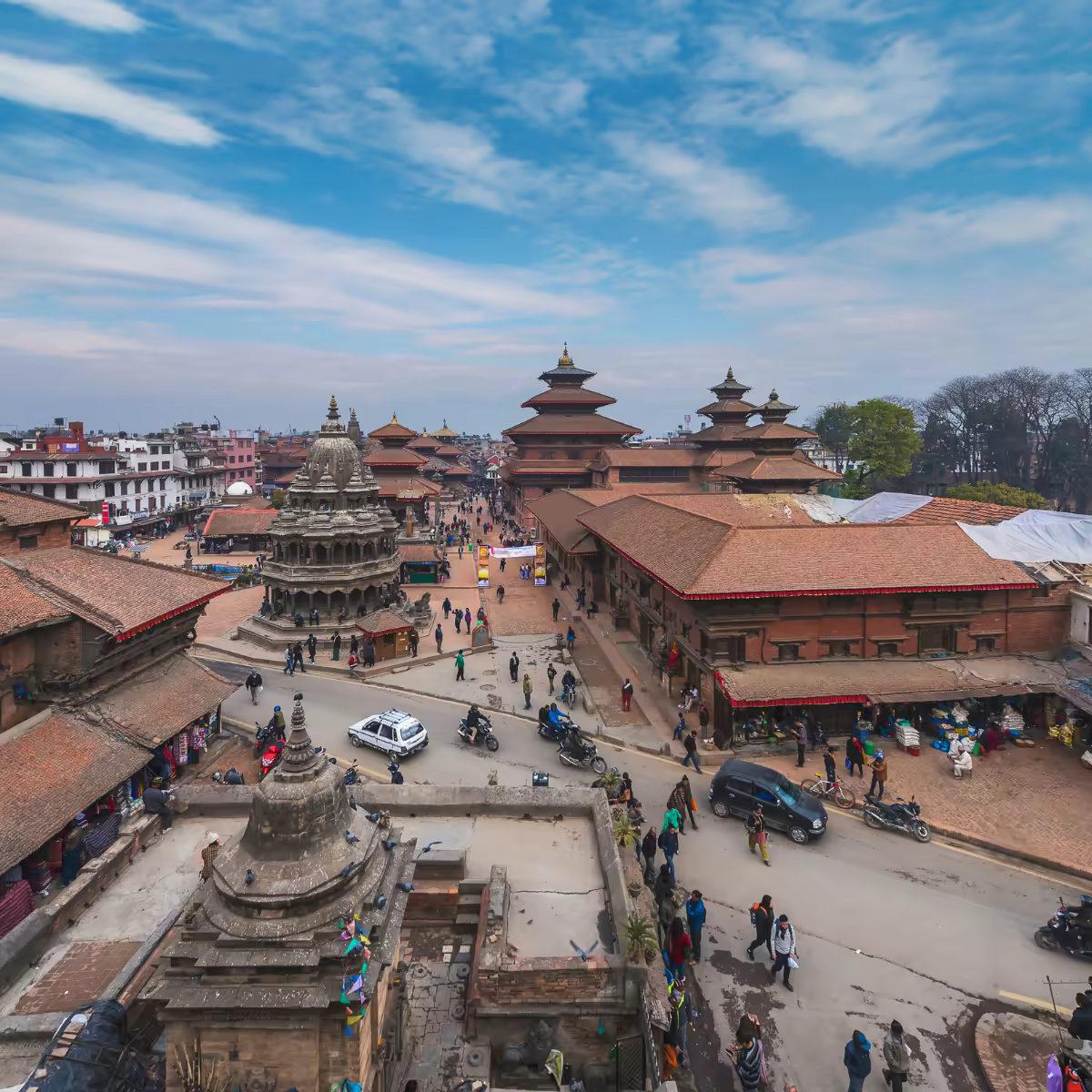 Kathmandu Durbar Square's carved Newari temples in soft morning light.