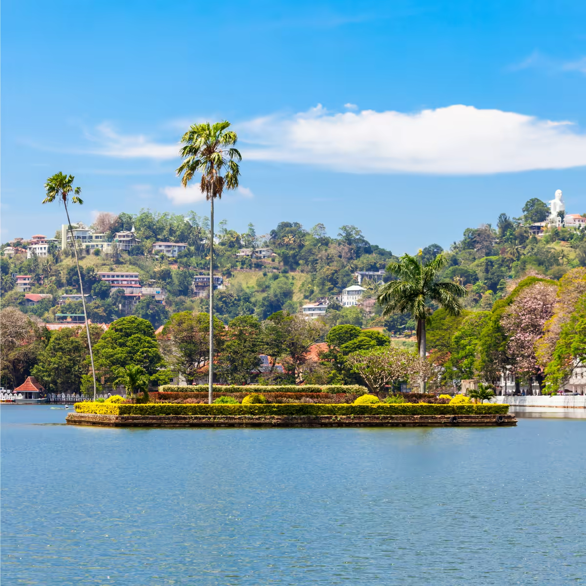 Kandy Lake beneath the green hills of central Sri Lanka.